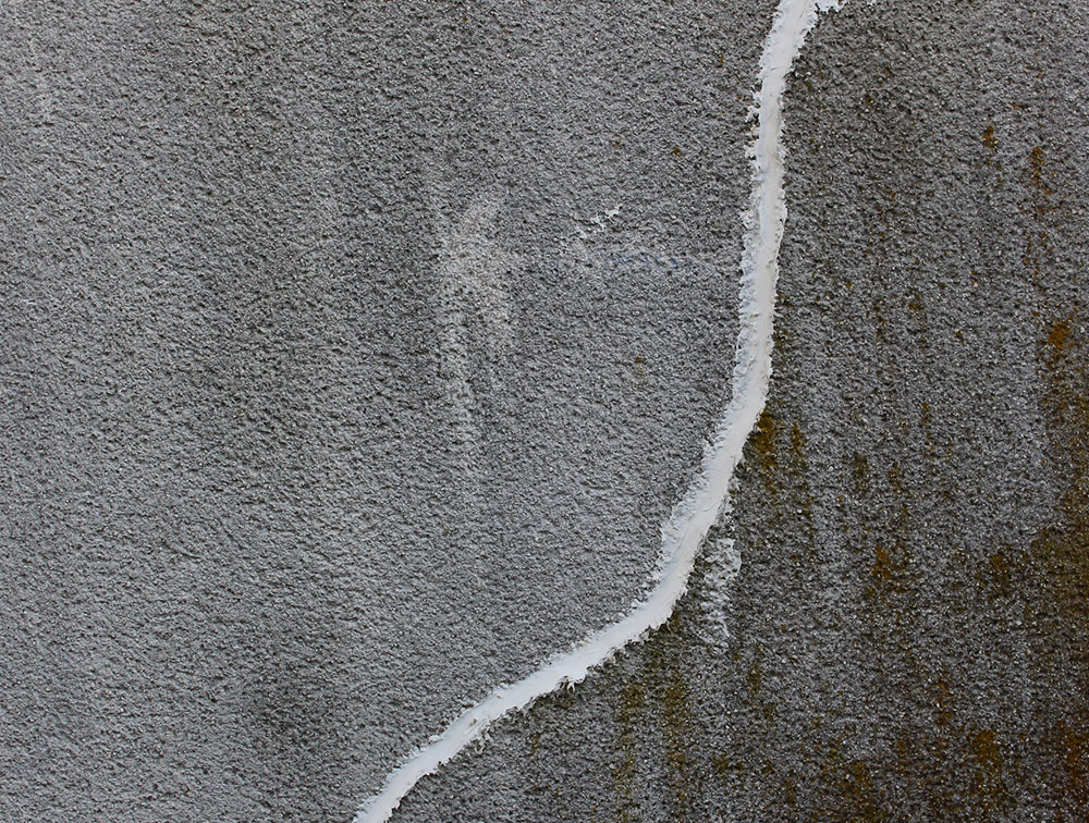 photo of a cracked concrete surface repaired by ESS in Edmonton