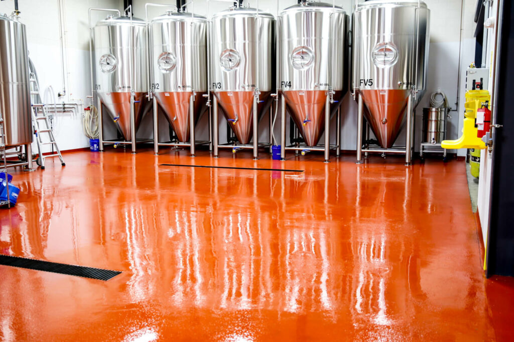 beautiful orange dyed and polished concrete surface in a commercial environment