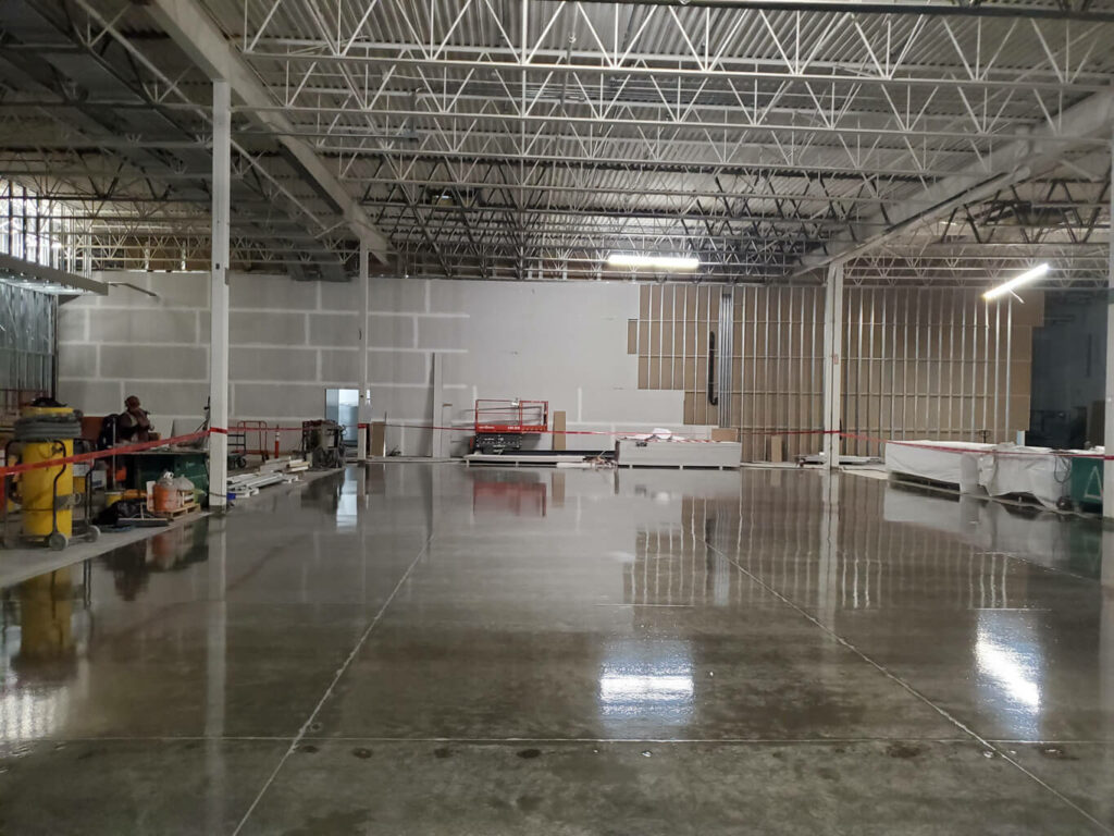 photo of a completed concrete resurfacing project in an Edmonton industrial shop