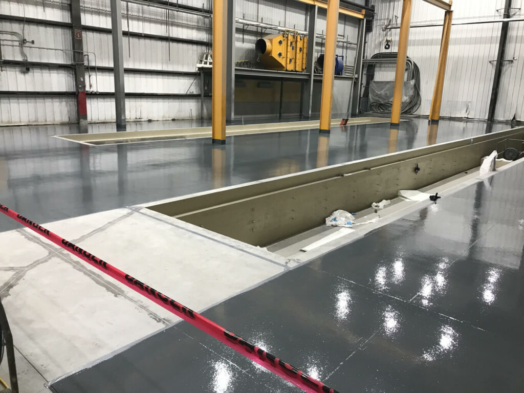 photo of a completed concrete surface in an industrial shop in Edmonton