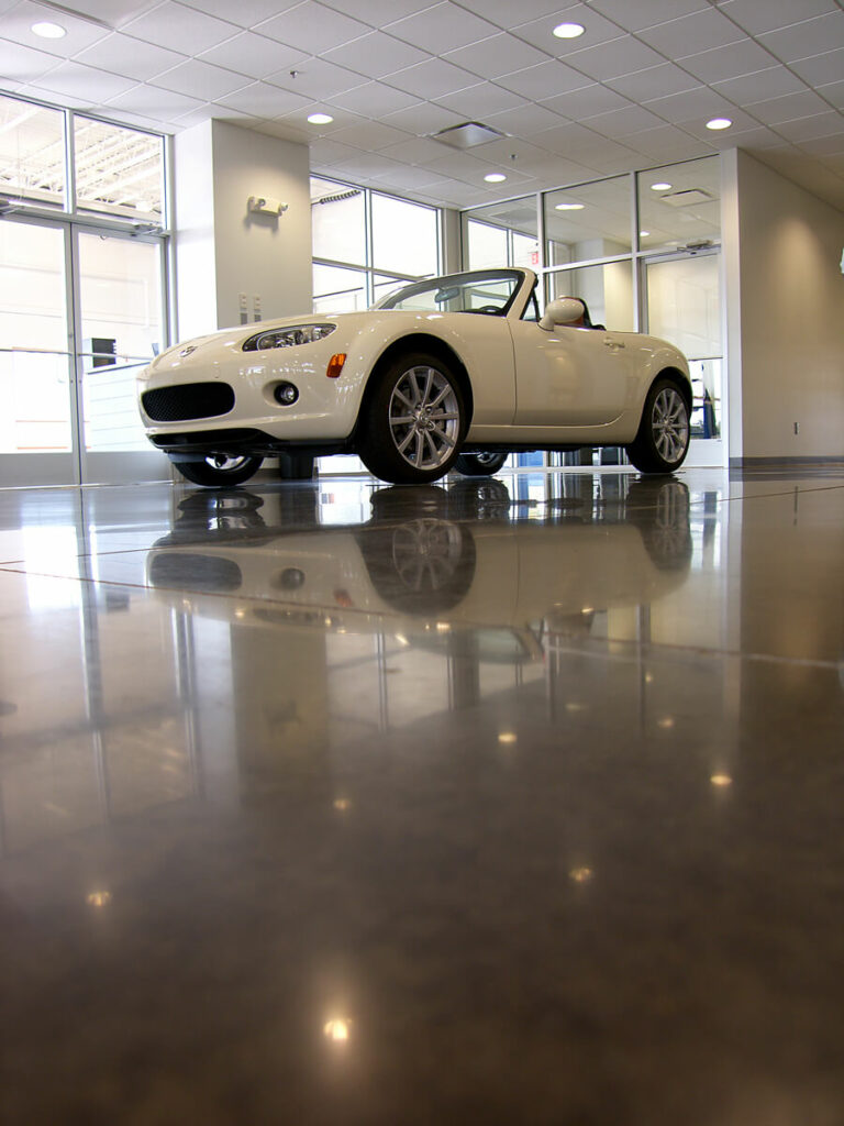photo of a car showroom with a polished concrete floor