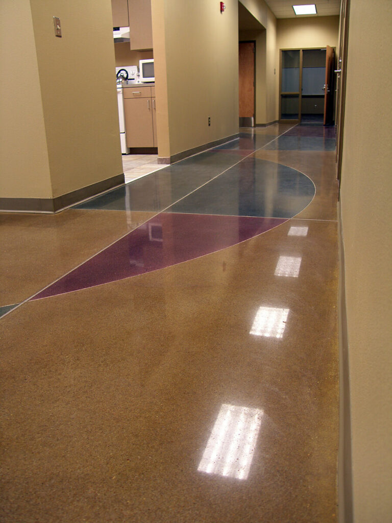 photo of a multi-colour polished concrete floor hallway